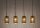 Lampe à suspendre métal 4 flammes noir or L : 90 cm E27