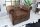 Fauteuil en simili cuir bois 65 cm en marron antique