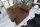 Fauteuil en simili cuir bois 65 cm en marron antique