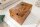 Table basse en teck naturel 90 x 60 cm artisanale