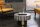 Table basse en marqueterie noire or blanc Ø 60 cm artisanale