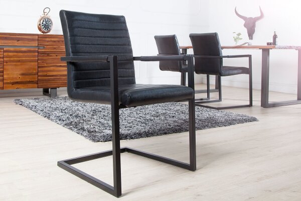 Chaise à bascule noir similicuir acier inoxydable avec accoudoirs