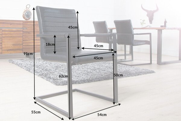 Chaise à bascule noir similicuir acier inoxydable avec accoudoirs