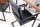 Chaise à bascule noir similicuir acier inoxydable avec accoudoirs