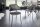 Chaise de salle à manger velours pieds métal gris noir design rétro